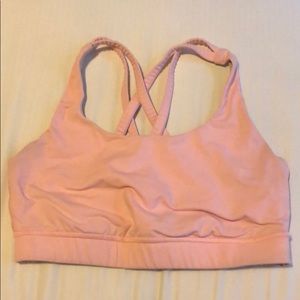 Pink Lululemon sports bra